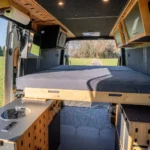 Campervan storage under pull out bed